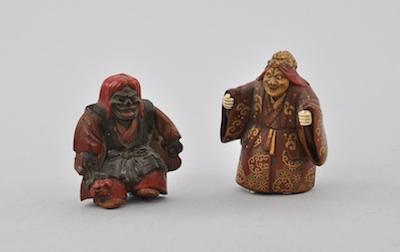 Appraisal: Two Shojo Netsukes Lacquered carved wood figure in red and