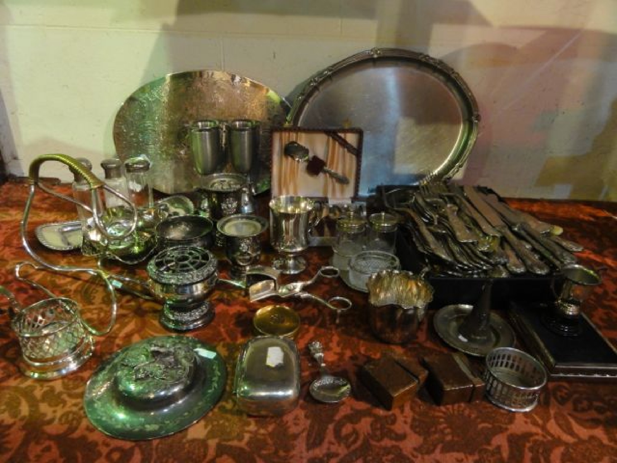 Appraisal: A box containing a selection of silver plated wares to