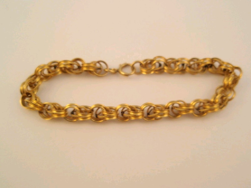 Appraisal: A fancy link yellow metal bracelet stamped K g