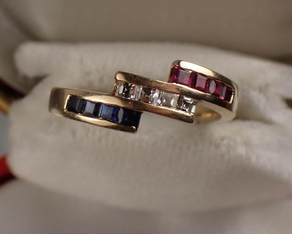 Appraisal: DIAMOND RUBY SAPPHIRE AND FOURTEEN KARAT GOLD RING The k