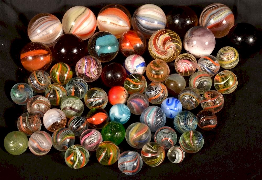 Appraisal: Lot of th C Glass Swirl Ribbon Core Marbles Lot