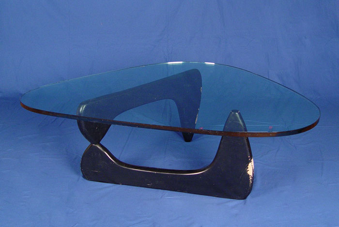 Appraisal: NOGOUCHI COFFEE TABLE Glass top rests on a black sculptural