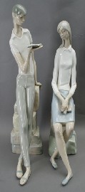 Appraisal: A pair of Lladro figures modeled as a boy and