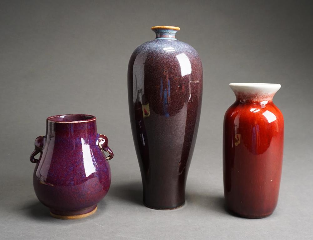 Appraisal: THREE CHINESE FLAMB TYPE GLAZED CERAMIC VASES H OF TALLER