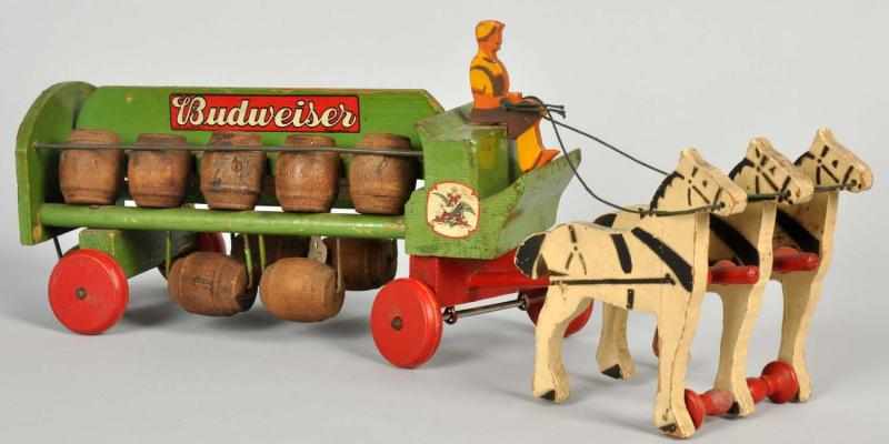 Appraisal: Wooden Horse-Drawn Budweiser Wagon Circa s Wood chipping and wear