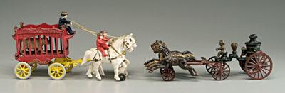 Appraisal: Two painted cast iron toys Overland circus wagon made by