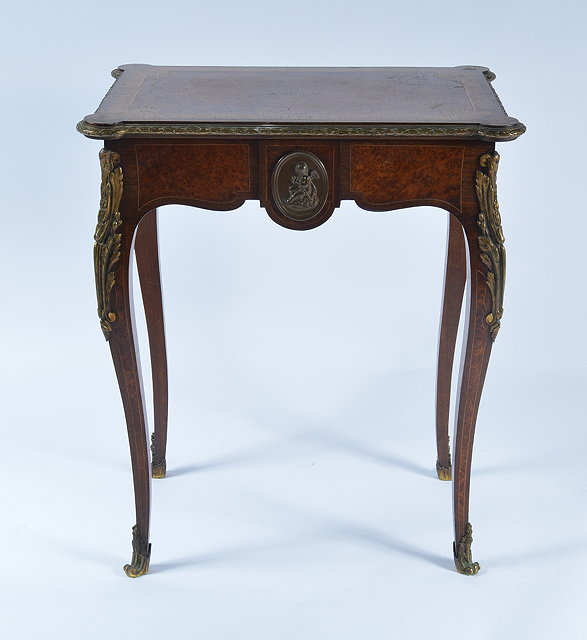 Appraisal: A French style amboyna and satinwood dressing tablelate th Centuryhaving