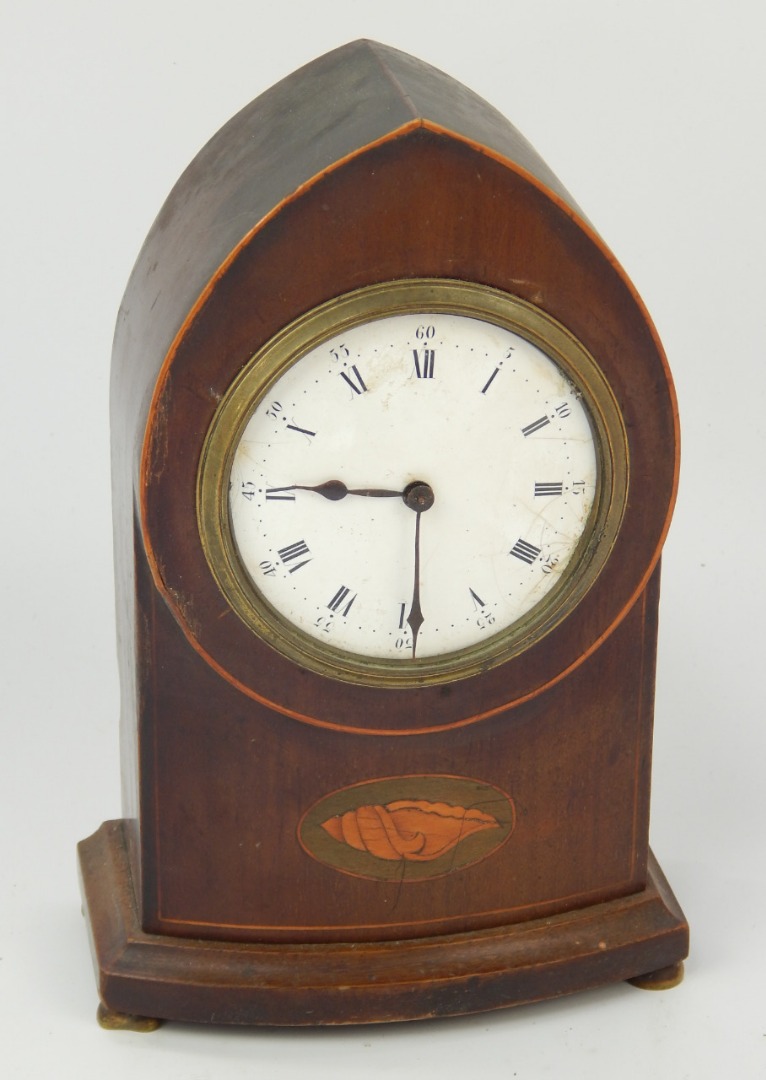 Appraisal: An Edwardian mahogany Lancet mantel clock with shell and string