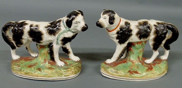 Appraisal: Rare pair of colorful Staffordshire Newfoundland dogs c See Harding