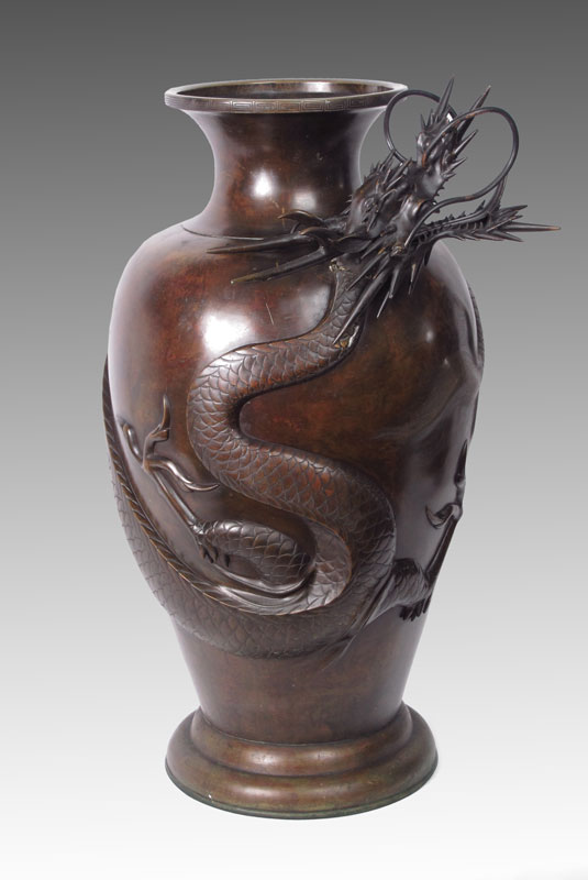 Appraisal: LARGE JAPANESE BRONZE DRAGON VASE Figural serpent or Dragon surrounds