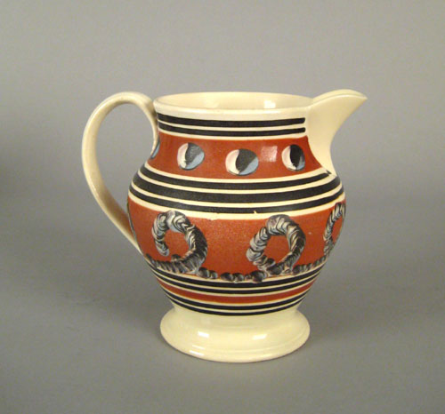 Appraisal: Mocha pitcher th c with earthworm and cat's eye decoration