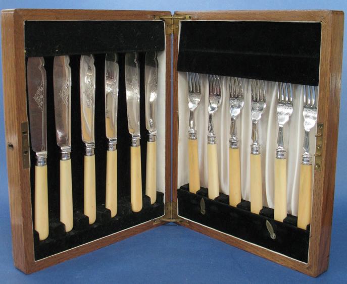 Appraisal: A SET OF SIX FISH KNIVES AND FORKS with bone