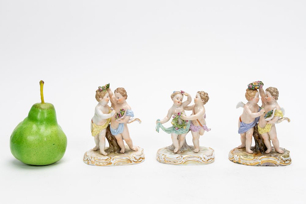 Appraisal: Three Meissen Porcelain Double Figures of Cherubs Seven th Century