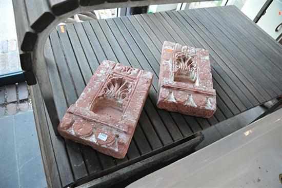 Appraisal: A PAIR OF ANTIQUE INDIAN CARVED ARCHITECTURAL STONES FROM A