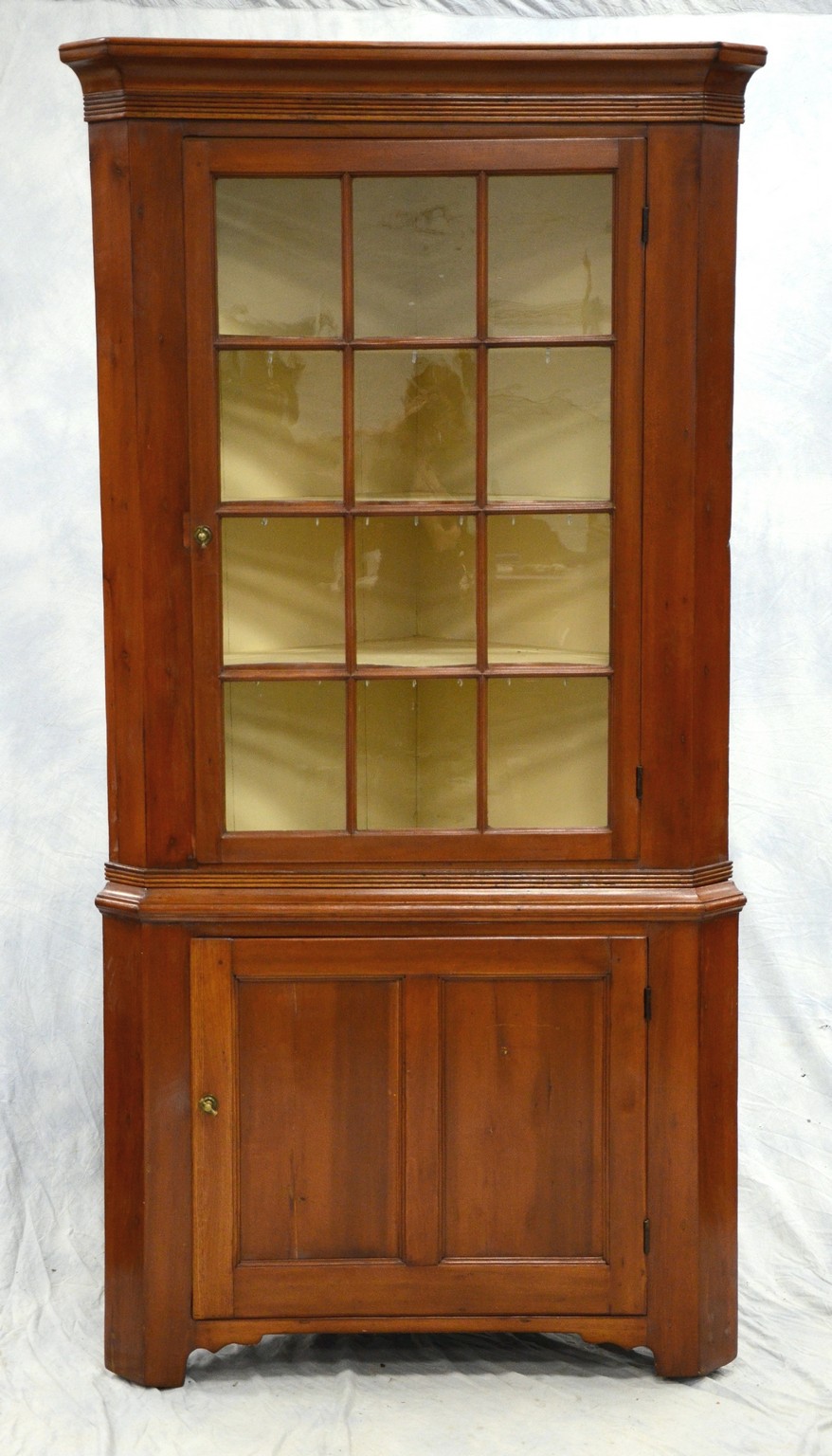 Appraisal: pane pc cherry corner cupboard reeded and cove cornice molding