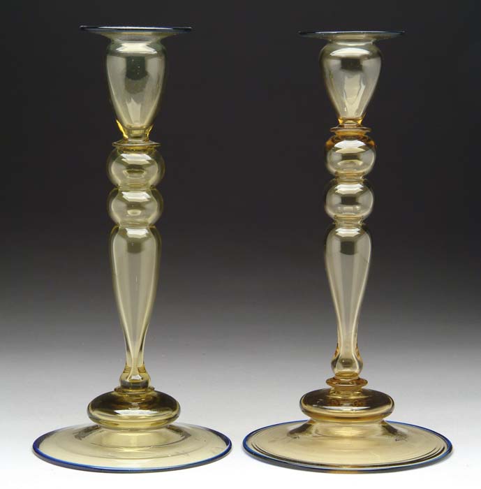 Appraisal: PAIR OF STEUBEN CANDLESTICKS Topaz hollow-blown candlesticks with applied Celeste