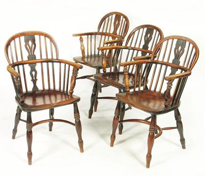 Appraisal: A harlequin set of four early th century Windsor low