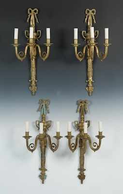 Appraisal: Four Cast Brass Electric Wall Sconces The four wall fixtures