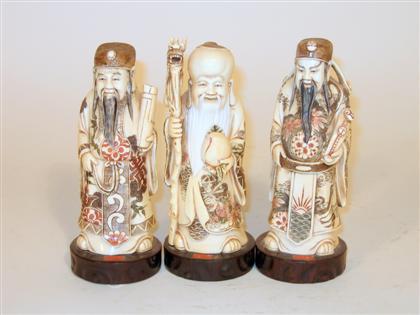 Appraisal: Three mammoth ivory and stained figures of Immortals th century