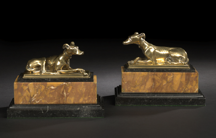 Appraisal: Pair of French Polished Bronze Garniture Figures of Recumbent Whippets