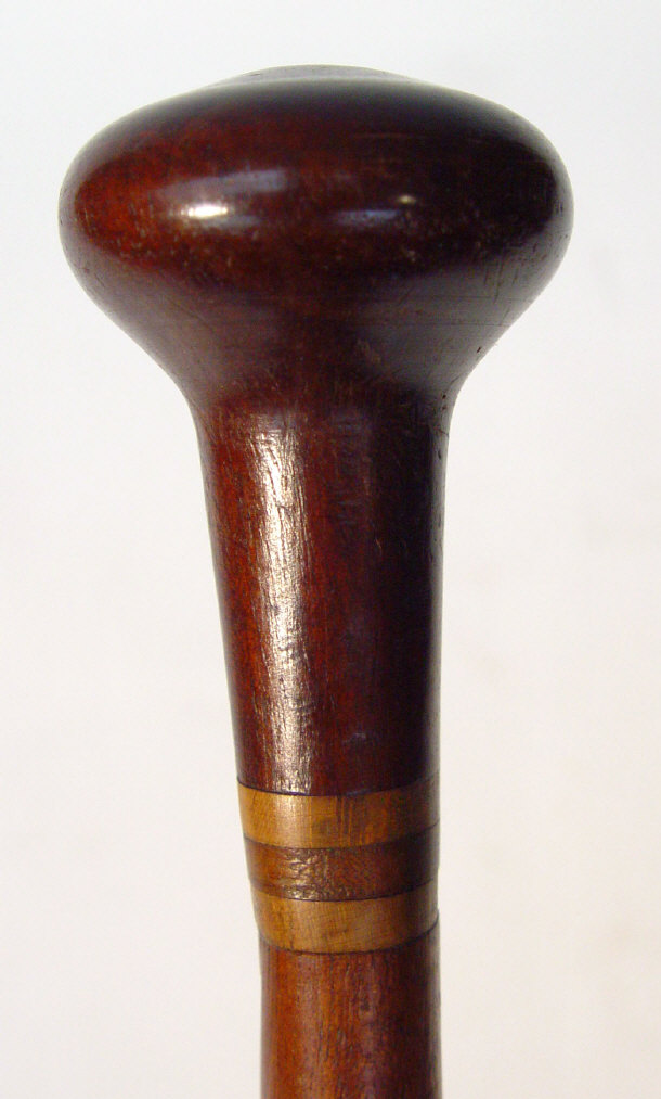 Appraisal: Three Edwardian walking canes with inlaid globular handles the largest