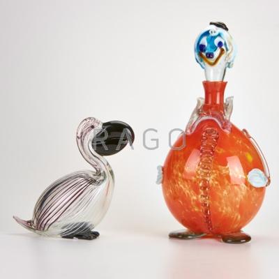 Appraisal: ITALIAN Two figural glass pieces pelican and clown decanter Pelican