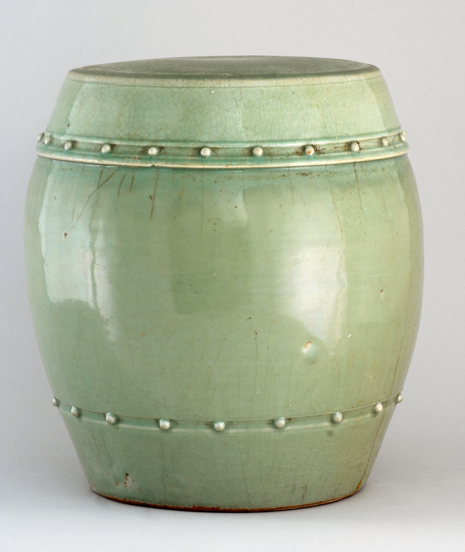 Appraisal: CELADON PORCELAIN GARDEN BARREL th CenturyBanded decoration with bosses Height