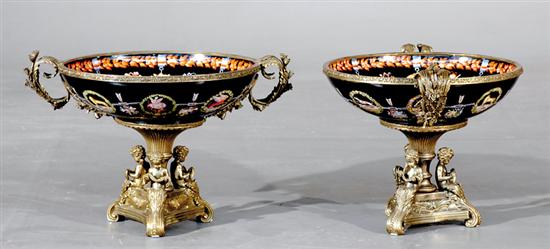 Appraisal: Pair Continental porcelain and gilt-metal compotes paint-decorated basin with scrolling