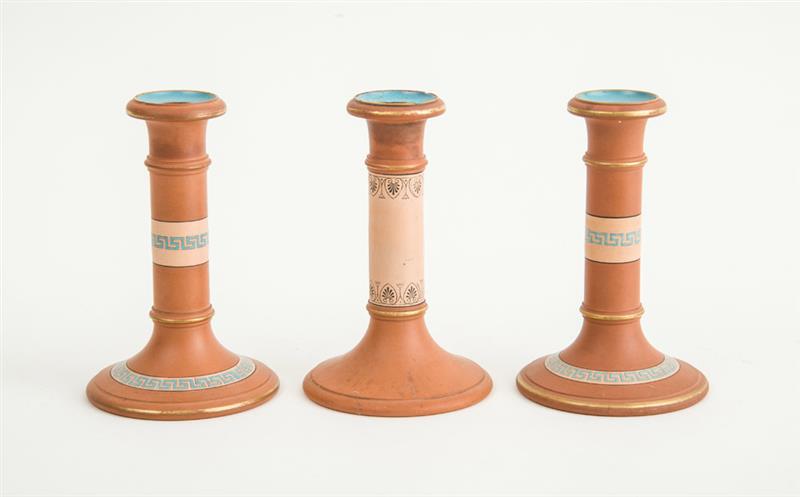 Appraisal: WATCOMBE TERRACOTTA CO TORQUAY Pair of candlesticks circa together with