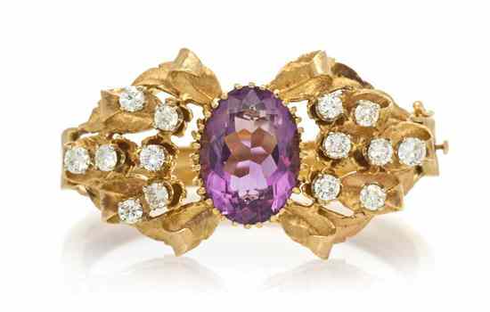 Appraisal: A Karat Yellow Gold Amethyst and Diamond Hinged Bangle Bracelet