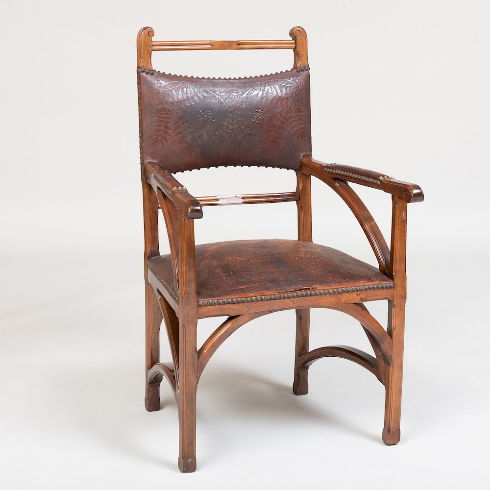 Appraisal: French Art Nouveau Walnut Armchair With an embossed leather backrest