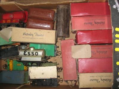 Appraisal: Twenty five playworn Hornby goods trucks including tankers coal trucks