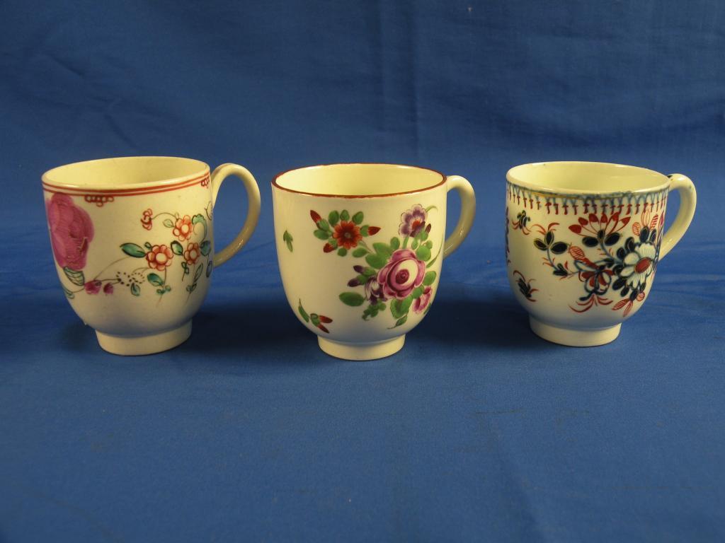 Appraisal: An thC Worcester polychrome coffee cup painted with simple flower