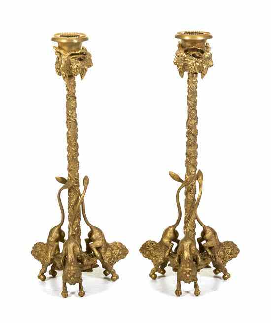 Appraisal: A Pair of Neoclassical Gilt Bronze Candlesticks each candle cup