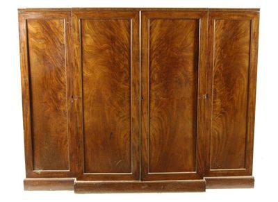 Appraisal: A George IV mahogany gentleman's breakfront wardrobe the detachable reeded