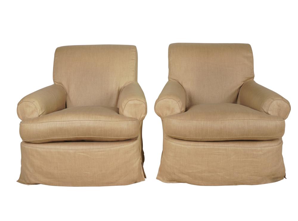 Appraisal: PAIR OF MICHAEL SMITH CLUB CHAIRSwith beige slip covers Provenance