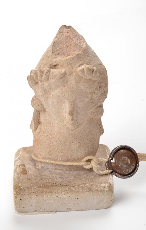 Appraisal: A TERRACOTTA FEMALE BUST CIRCA FOURTH CENTURY B C wearing