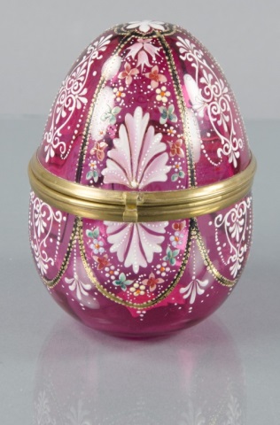 Appraisal: Moser Bohemian Egg-Shaped Cranberry Trinket BoxDecorated with enameled florals and