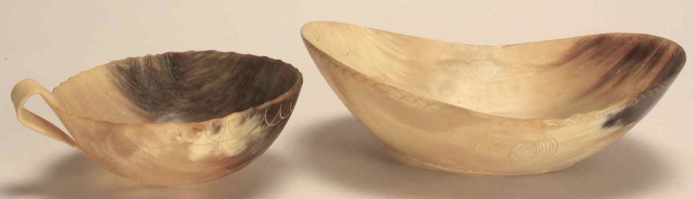 Appraisal: TWO ENGRAVED HORN ITEMS th CenturyOval bowl length and width