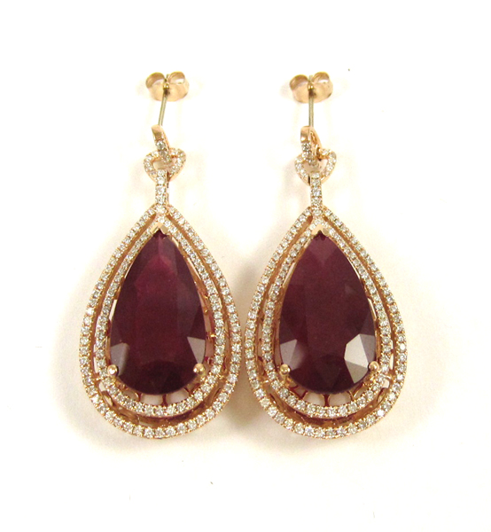 Appraisal: PAIR OF RUBY AND DIAMOND EARRINGS each k rose gold