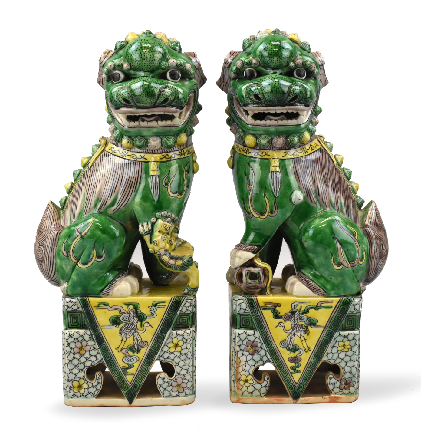 Appraisal: A pair of colorful large Sancai glazed Foo Dogs th