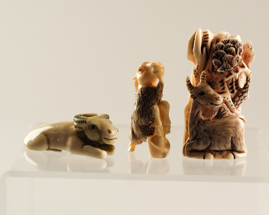 Appraisal: Three Carved Ivory Netsukes a hippo a goat with background