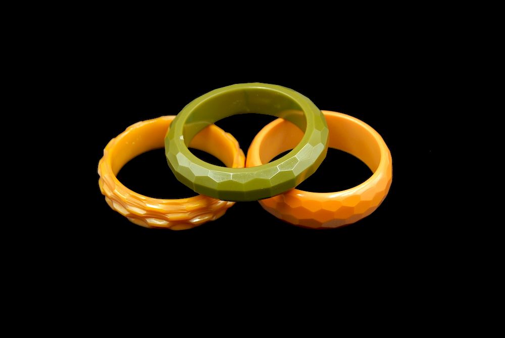 Appraisal: Bakelite Faceted Bracelets Caramel Orange Green Bakelite Faceted Bracelets Caramel