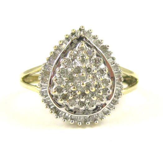 Appraisal: DIAMOND AND TEN KARAT YELLOW AND WHITE GOLD RING with