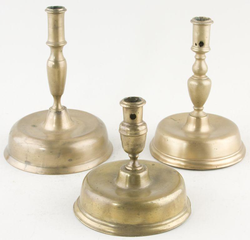 Appraisal: Group of Three Brass Candlesticks ca probably Spanish baluster and