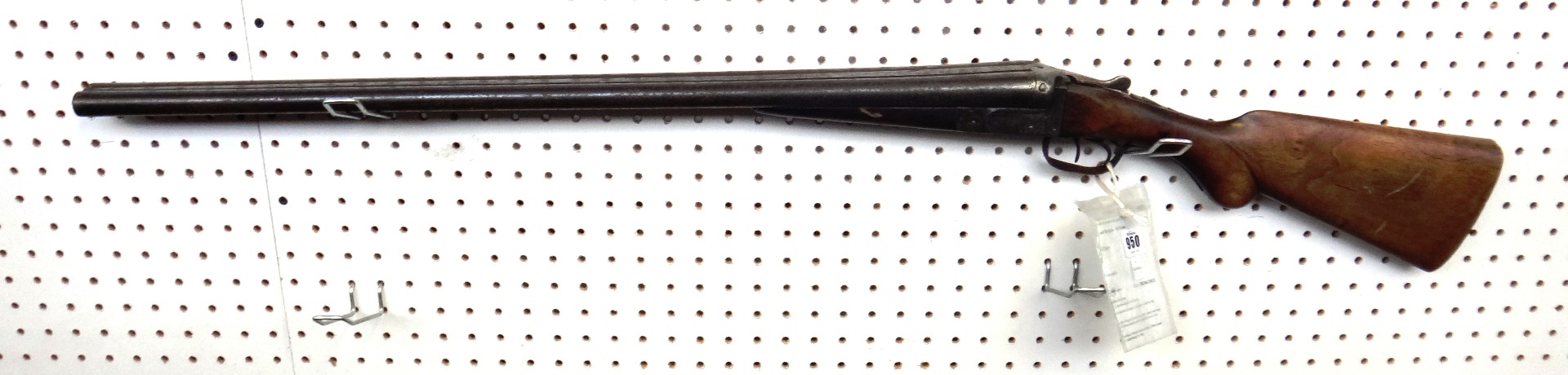 Appraisal: A bore English double barrel shotgun with plain steel barrels