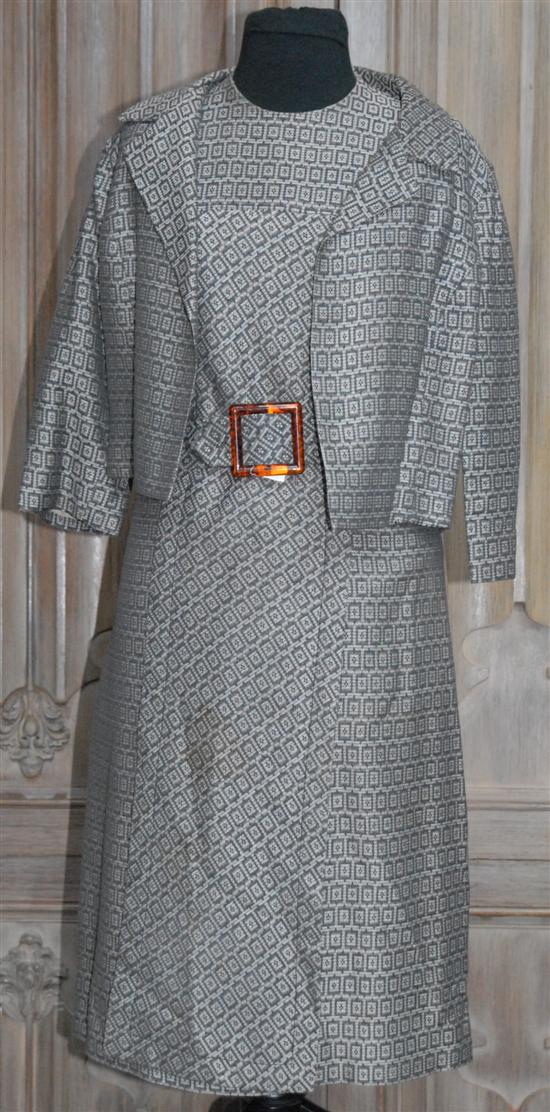 Appraisal: NINA RICCI JACKETED DRESS Gray tones front pleat belt sizes