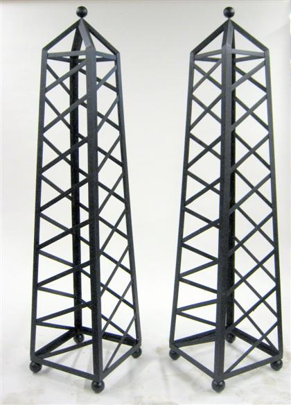 Appraisal: Pair of painted wrought iron garden topiaries modern Painted black