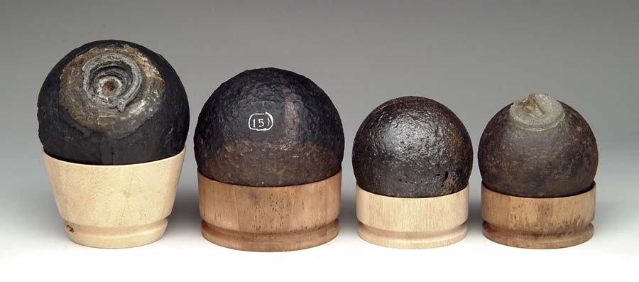 Appraisal: LOT OF FOUR CANNONBALLS All excavated -pounder solid shot US