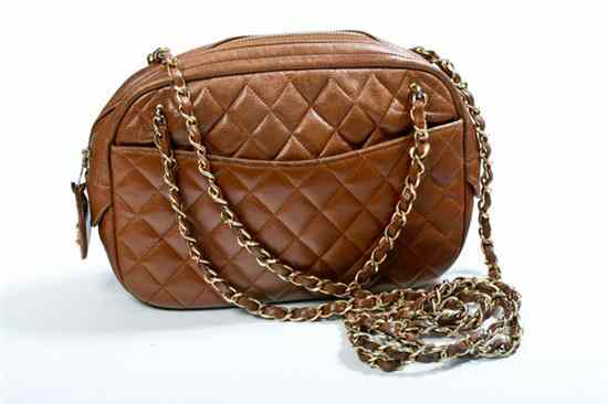 Appraisal: CHANEL DARK BEIGE QUILTED LEATHER CAMERA BAG s The exterior